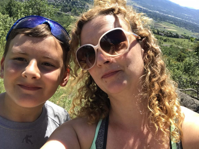 Me (and my curls) with my son (who has a slight wave)